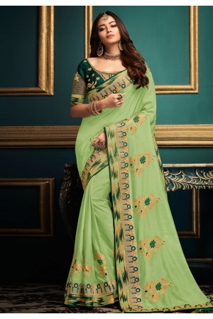 Light green satin embroidered party wear saree  10604